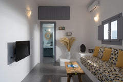A cosy modern complex of suites with the traditional island style that suits the Greece Blue White Suites "Deluxe Suite with Hot Tub" Entire serviced apartment vacation rental 43962261